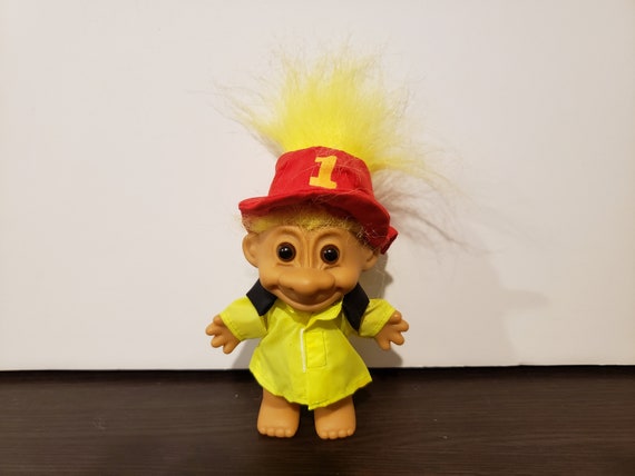 yellow troll doll