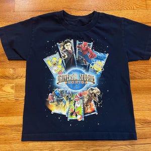 00s/Y2K Universal Studios Florida vintage t-shirt vacation tee Orlando Spider-Man transformers the Simpsons size youth large Jurassic park