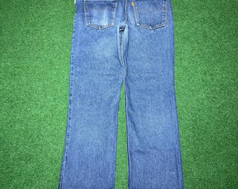 Vintage Levi's jeans uit de jaren 70, denim broek, gemaakt in de VS, oranje label SF207 (34x30)