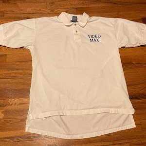 90s video store uniform polo shirt true vtg original The Out-of-Towners movie promo vhs 1999 Steve Martin Goldie hawn dvd blockbuster max