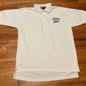 90s video store uniform polo shirt true vtg original The Out-of-Towners movie promo vhs 1999 Steve Martin Goldie hawn dvd blockbuster max