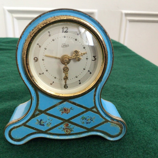 Vintage eyes musical mantle clock