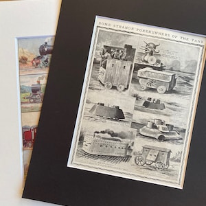 May include: A framed print showing historical illustrations of early tank concepts and steam locomotives. The print is matted in black and white, with the text "SOME STRANGE FORERUNNERS OF THE TANK". The image is on a white background.
