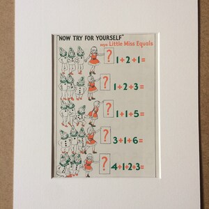 May include: Vintage educational print featuring illustrations of children and gnomes with math problems. The text reads "NOW TRY FOR YOURSELF" and "Little Miss Equals" with addition equations. The print is framed in a white mat.