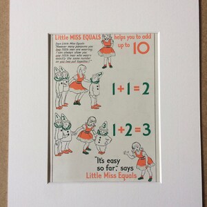 May include: Vintage educational print featuring illustrations of children and the text "Little Miss Equals." The print teaches basic addition with equations like 1+1=2 and 1+2=3. The artwork is framed in a white mat.