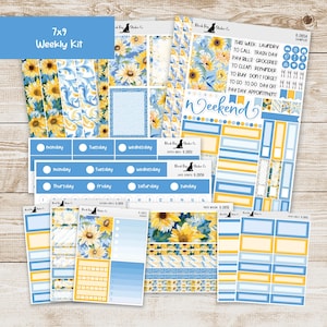 May include: A 7x9 weekly kit with a sunflower theme. The kit includes stickers with blue, yellow, and white designs. The kit has labels for each day of the week, plus weekend and to-do list stickers.