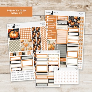 May include: A set of fall-themed planner stickers featuring pumpkins, gingham patterns, and floral designs. The stickers are designed for use with the Hobonichi Cousin planner. The set includes a weekly kit with daily boxes, a weekend kit, a week-of-the-month kit, and a calendar kit.