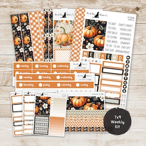 May include: A 7x9 weekly planner kit with a fall theme. The kit includes a variety of stickers, including a pumpkin design, a gingham pattern, and a black dog logo. The kit also includes a checklist with tasks such as "to buy", "to call", and "to clean".