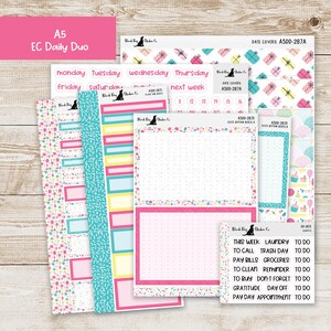 May include: A collection of colorful planner stickers with a pink, blue, yellow, and white confetti theme. The stickers include labels for days of the week, date covers, and to-do lists. The text "A5 EC Daily Duo" is visible.
