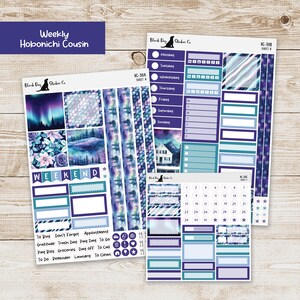 May include: Two sheets of planner stickers with a purple and blue color scheme. The stickers include boxes, labels, and decorative elements with a winter theme. Text includes "Weekly Hobonichi Cousin" and "Weekend".