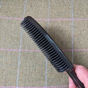 A Berkeley Dog Hair Remover Brush helps keep all soft furnishings free of unwanted pet hair.
