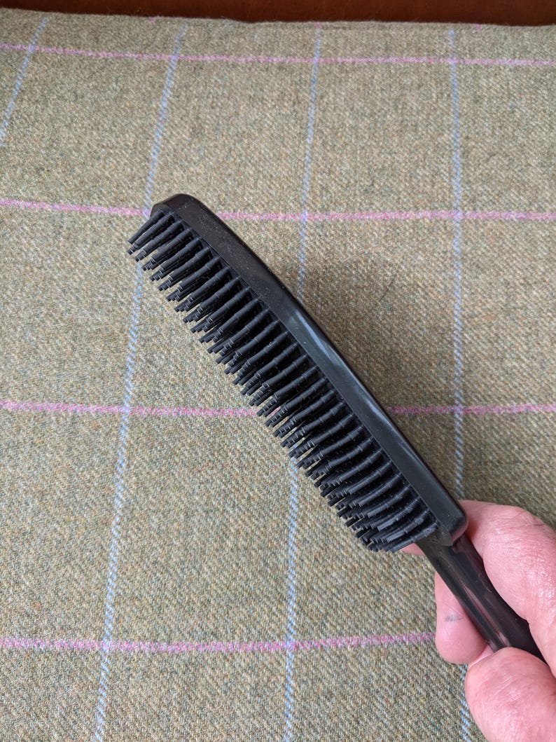 A Berkeley Dog Hair Remover Brush helps keep all soft furnishings free of unwanted pet hair.