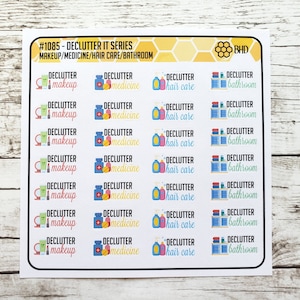 May include: A sheet of 12 colorful stickers with the text "Declutter It Series" and "Makeup/Medicine/Hair Care/Bathroom" at the top. Each sticker has a different icon and the words "Declutter" and either "makeup", "medicine", "hair care", or "bathroom".