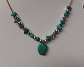 TURQUOISE Nugget and SILVER Beaded Necklace on LEATHER strand. Silver Eternity Clasp.