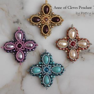 May include: Four beaded cross pendants in different colors. The crosses are made with seed beads and feature a central stone. The colors are turquoise, pink, gold, and copper.