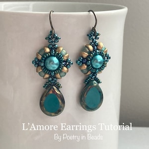 May include: A pair of handcrafted earrings with a floral design. The earrings feature teal teardrop-shaped pendants and teal and gold beadwork. The text "L'Amore Earrings Tutorial By Poetry in Beads" is visible at the bottom of the image.