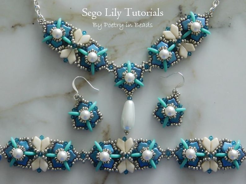 May include: A set of turquoise and white beaded jewelry featuring a necklace, earrings, and a bracelet. The jewelry is made with seed beads and pearls and has a floral design. The text "Sego Lily Tutorials By Poetry in Beads" is visible in the image.