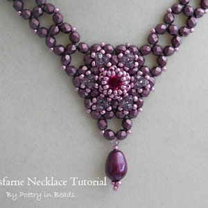 May include: A close-up of a purple and pink beaded necklace with a flower-shaped pendant and a single purple bead hanging from the bottom. The necklace is made with small, faceted beads and has a delicate, intricate design.