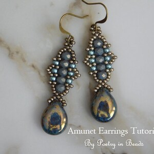 May include: A pair of silver and blue beaded earrings with a teardrop-shaped iridescent blue stone at the bottom. Amunet Earrings Tutorial by Poetry in Beads.