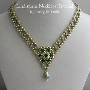 May include: A green and gold beaded necklace with a flower pendant and a pearl drop. The necklace is on a white mannequin bust. The text "Lindisfarne Necklace Tutorial By Poetry in Beads" is at the top of the image.