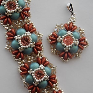 May include: A teal and copper beaded bracelet and pendant with a silver clasp. The bracelet and pendant feature a repeating flower design with clear and pink crystals.