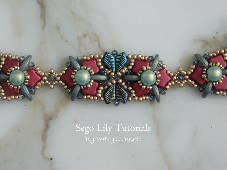May include: A close-up of a beaded bracelet with a repeating pattern of red, blue, and gold beads. The bracelet is made with seed beads and features a flower design. The text "Sego Lily Tutorials By Poetry in Beads" is visible below the bracelet.