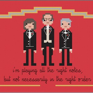 May include: A red background with a gold frame and three pixelated figures in black suits and white shirts with a red rose on the lapel. The text below the figures reads "i'm playing all the right notes, but not necessarily in the right order."