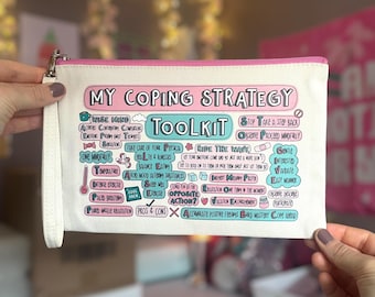 May include: A white canvas zippered pouch with a pink and blue design. The pouch has the text "My Coping Strategy Toolkit" printed on it. The toolkit includes a list of coping strategies such as "Wise Mind", "Take Care of Your Physical Health & Wellness", "Ride the Wave", "Stop Take a Step Back", "Observe Proceed Mindfully", "Opposite Action", "Vacation/Enrichment", "Accumulate Positive Feelings", "Build Mastery", "Cope Ahead".
