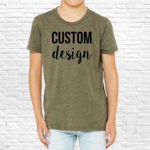 May include: A green short-sleeved t-shirt with the text "CUSTOM design" printed on the front.