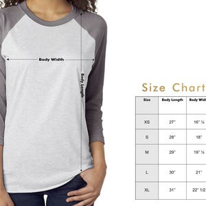 May include: A size chart for a baseball tee shirt with measurements in inches. The chart shows the size, body length, and body width for sizes XS, S, M, L, and XL.