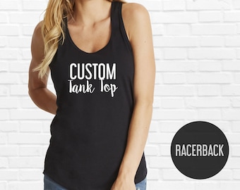 May include: Black racerback tank top with the text "CUSTOM Tank Top" in white lettering.