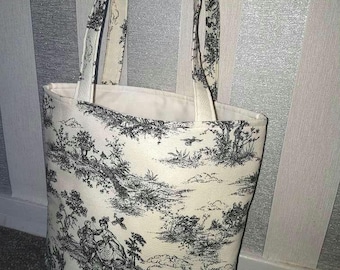 Bolso tote/shopper Toile de Jouy en color negro sobre fondo marfil. Con bolsillos. Gimnasio, escuela, trabajo, compras