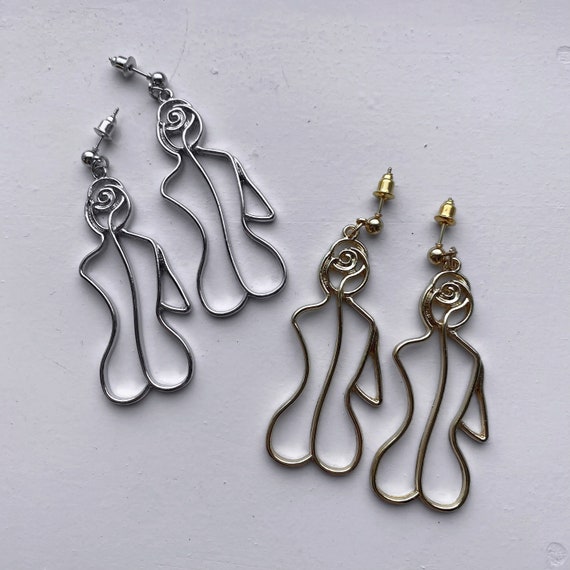 Female body shop earrings