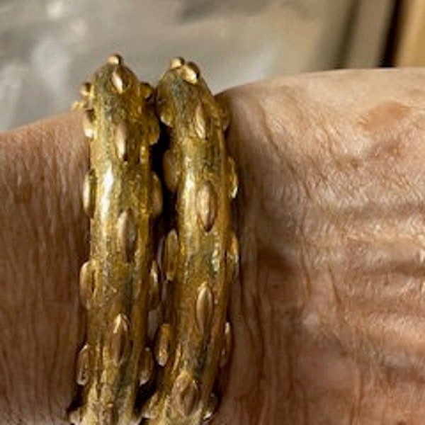 Exceptional Pair of Vintage Pauline Rader Hinged Golden Bangles