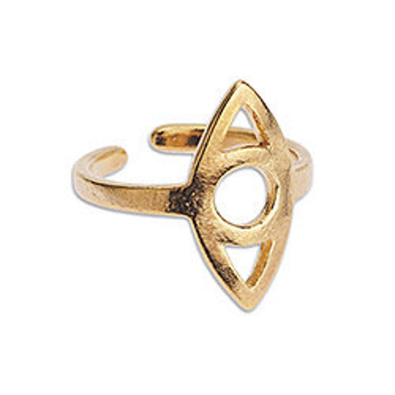 May include: Gold-colored adjustable ring with an open, geometric design. The ring features a central circular opening within a pointed, eye-shaped frame. The band is open, allowing for size adjustment. The ring is set against a white background.