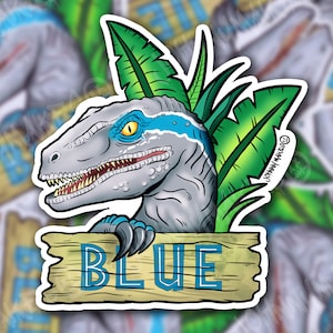 May include: A sticker featuring a cartoon illustration of a blue velociraptor with green leaves behind it. The dinosaur is holding a wooden sign that says "BLUE".