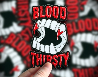 Blood Thirsty Vampire Teeth Sticker or Magnet
