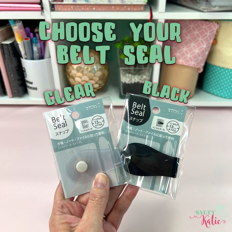 May include: Two clear plastic packages containing black and clear belt seals. The packages are labelled 'Belt Seal' and 'スナップ' (snap) in Japanese. The text on the packages reads '手帳・ノート・ファイルに貼って便利' (Convenient for sticking to notebooks, files, and folders).