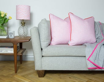 Brand cushion in Pink