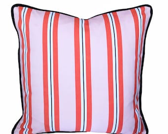 Tick cushion in pink and red