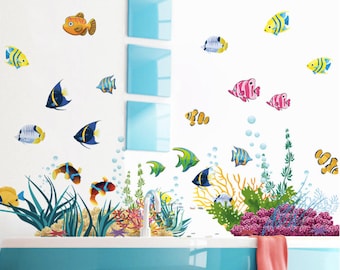 May include: A blue bathtub with a colorful underwater scene of fish, seaweed, and bubbles. The scene includes a variety of fish, including orange, blue, yellow, and pink fish. The scene is perfect for a bathroom or nursery.