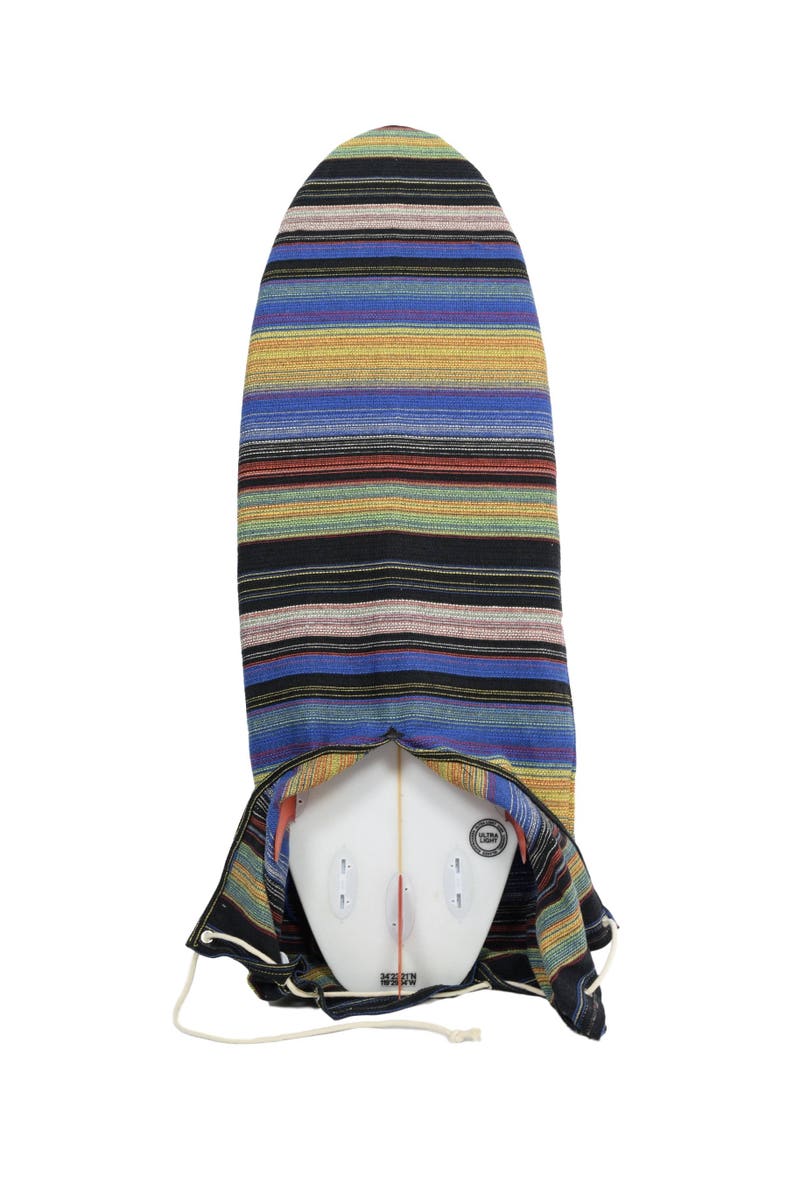 May include: A colorful striped surfboard cover with a drawstring closure. The cover is made of a soft, durable fabric and features a unique pattern. The cover is designed to protect your surfboard from the elements and keep it looking its best.