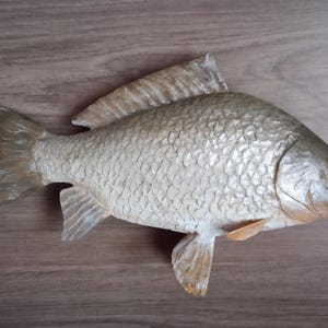 Pode incluir: Conjunto de três vasos de cerâmica branca com textura canelada. Os vasos medem aproximadamente 25 cm, 20 cm e 15 cm de altura. Design simples e moderno.