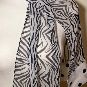 Delightful Sheer Black and White Zebra Patterned  52” Long Scarf by Jacqueline Ferrar