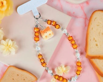 Adorno para teléfono con forma de tostada de Shiba