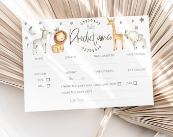 May include: A white card with a baby shower prediction game. The card features a giraffe, zebra, lion, and elephant illustrations. The card has spaces to write in the baby's name, length, weight, date of birth, time of birth, hair color, and eye color. The card also has a section for guests to predict if the baby will look like the mom or dad.