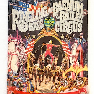 May include: Vintage Ringling Bros. and Barnum & Bailey Circus souvenir program cover. The cover features a colorful illustration with the text "The Greatest Show on Earth." The image includes horses, tigers, and circus performers.