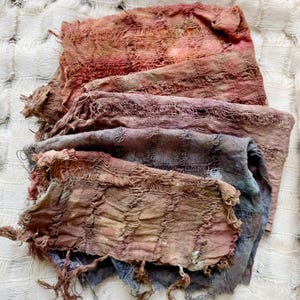 Hand dyed open weave distressed textile for felters and artists; also suitable for framing