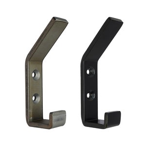 May include: Two metal hooks, one in a silver finish and one in black. Both hooks have a simple, angular design with two holes for mounting.