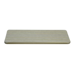 May include: A rectangular, light beige wooden shelf with rounded corners. The shelf has horizontal grooves across its surface, giving it a textured appearance. The shelf is designed to be mounted on a wall for display or storage.